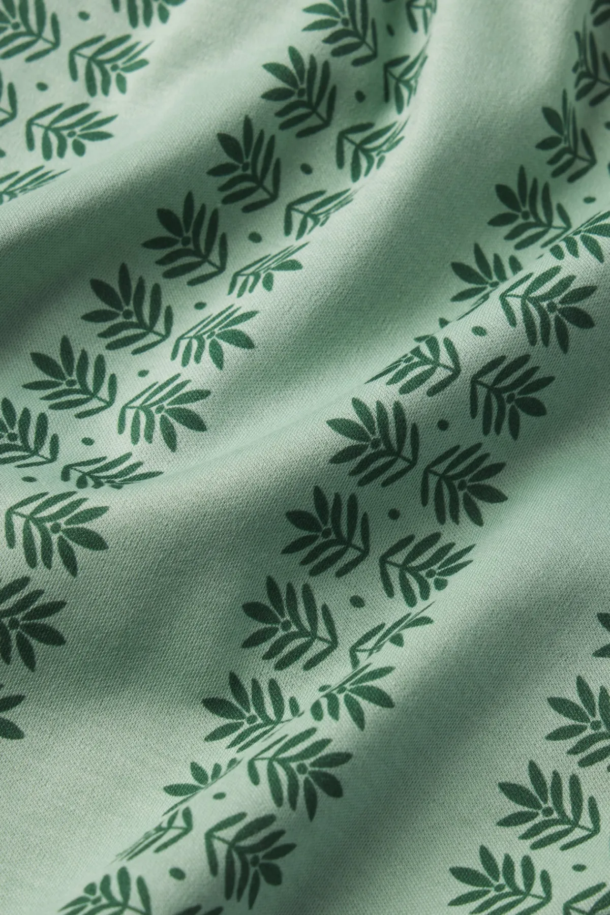 pima-ruffle-shorts-set-in-gran-duZdEtLo-4.webp LAKE Shorts Sets|View All>Pima Ruffle Shorts Set in Granite Green Trellis